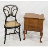 A mother-of-pearl inlaid cane-seated bedroom chair and a sewing box on cabriole supports (2)