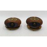 Two Tannoy super-tweeters in stained figured wood cases and brass-coloured metal stands, with