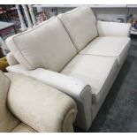 A two-seat cream-coloured upholstered sofa bed  Condition ReportThe length is 170 cm.