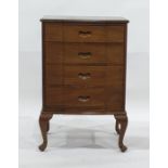 A 20th century Eastern chest of four long drawers, to cabriole supports, 53.5cm x 83cm