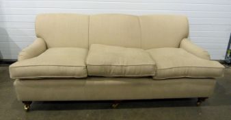S Rouse & Co of Cheltenham beige ground three-seat sofa in the manner of Howard & Sons Condition