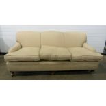 S Rouse & Co of Cheltenham beige ground three-seat sofa in the manner of Howard & Sons Condition