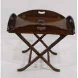 A reproduction mahogany butler's tray on stand