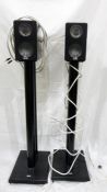 Pair of Elac black metal speakers, rectangular on double-cylindrical column stands and bases (2)