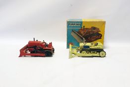 Corgi Toys 1102 "Euclid" TC-12 tractor with dozer blade together with Dinky Supertoys Blaw Knox