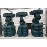 Three carved wooden elephant conservatory seats, painted turquoise