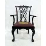 18th century carver chair in the manner of Chippendale, the carved and shaped toprail above the