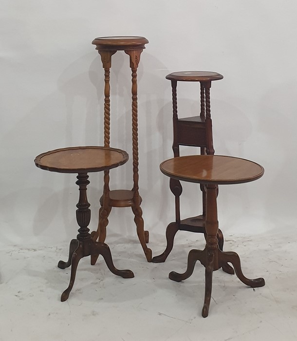 A 20th century plant stand, two circular coffee tables and another stand (4)