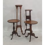 A 20th century plant stand, two circular coffee tables and another stand (4)