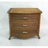 A 20th century wicker and cane bowfront chest of three drawers, 83cm x 78cm