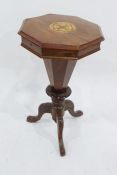 19th century walnut octagonal-topped sewing table, the body of faceted trumpet form to three