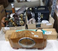 Two boxes of assorted household items to include brass candlesticks and a walnut clock, etc