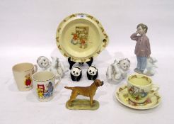 Royal Doulton 'Bunnykins' pattern warmer and a teacup and saucer, printed brown marks, two nursery