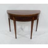 A 19th century mahogany demi-lune tea table, the foldover top above single drawer, with inlaid