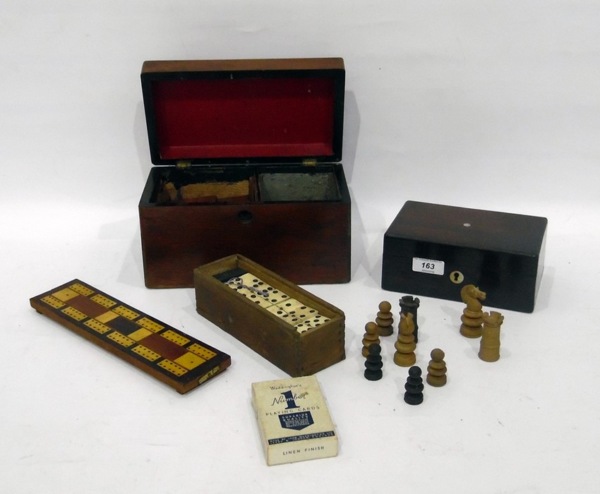 Box of playing cards, chess pieces, cribbage board, dominoes and a rosewood box