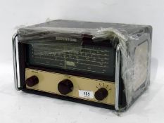 Eddystone vintage radio receiver in maroon metal case by Stratton and Co serial number IM3495,