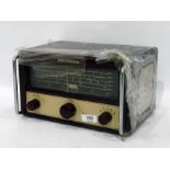 Eddystone vintage radio receiver in maroon metal case by Stratton and Co serial number IM3495,