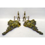 Pair French style glass chenets, each rococo and foliate scroll pattern with pierced plinth base,