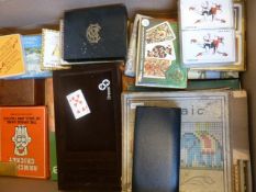 Box of assorted playing cards and other items