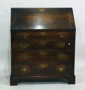 An oak bureau of four drawers, to bracket feet, 89cm x 107cm  Condition ReportSee attached images.