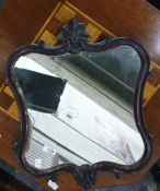 Mahogany framed shaped mirror