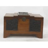 20th century Chinese camphorwood lined blanket chest, the stepped top with carved central panel, the