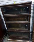 Oak four-section Globe Wernicke bookcase, three sections bearing ivorine labels marked 'The Globe-