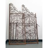 Pair of wrought iron garden gates with scroll decoration and a further gate (3)  Condition ReportThe