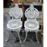 A pair of Coalbrookdale style white painted iron chairs (2)