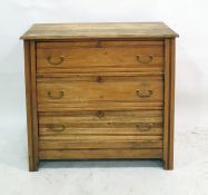 Edwardian satin walnut chest of three long drawers with fluted decoration