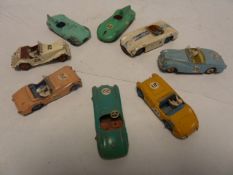 Eight Dinky racing cars (five with drivers) to include Sunbeam Alpine, Aston Martin 110, Triumph
