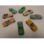 Eight Dinky racing cars (five with drivers) to include Sunbeam Alpine, Aston Martin 110, Triumph