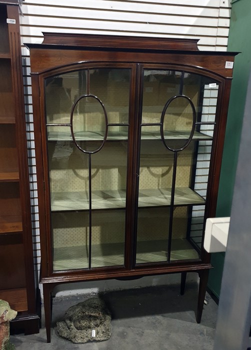 A 19th century mahogany display cabinet, the astragal-glazed doors enclosing three shelves, to