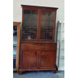 19th century mahogany secretaire library bookcase, the top with dentil cavetto cornice, fitted