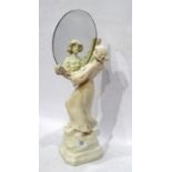 Composition Art Nouveau style composition figure holding a circular frameless mirror