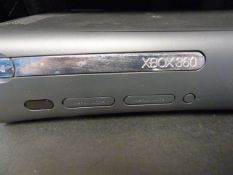 XBox 360 and two controllers