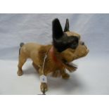 Early 20th century papier mache pull-along French bulldog automaton with nodding head, pull chain