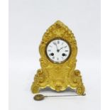 French gilt ormolu mantel clock in cartouche case, allover chased with ornate scrolls and foliage,