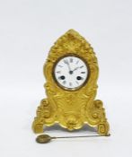 French gilt ormolu mantel clock in cartouche case, allover chased with ornate scrolls and foliage,