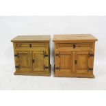 Pair of pine bedside chests, the rectangular tops above single drawers, two cupboard doors, plinth