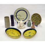 Various items of pottery, to include a tin-glazed bust of a child - 16 cm. high, a pottery charger