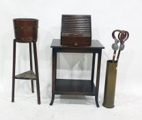 An oak jardiniere stand, a brass military shell and two shooting sticks