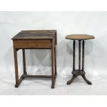 An oak child's school desk and a pine centre table with octagonal top, three fluted pillars united