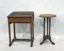An oak child's school desk and a pine centre table with octagonal top, three fluted pillars united