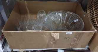 A large late Victorian cut glass bowl, with jagged edges and panels, and assorted brandy balloons,