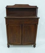 Early Victorian mahogany chiffonier, the raised ledge back with single shelf supported by pair