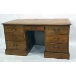 19th century pine partner's desk, the rectangular top with moulded edge, assorted drawers and