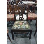 18th century mahogany chair, the carved toprail above the shaped and pierced backsplat, needlework