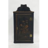 George III lacquered corner-hanging wall cabinet with chinoiserie scene to the single door, brass