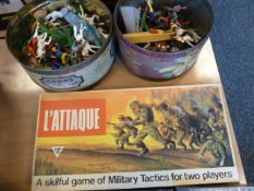 Assorted toys to include two tins of cowboy and native American toys, quantity of children's books,